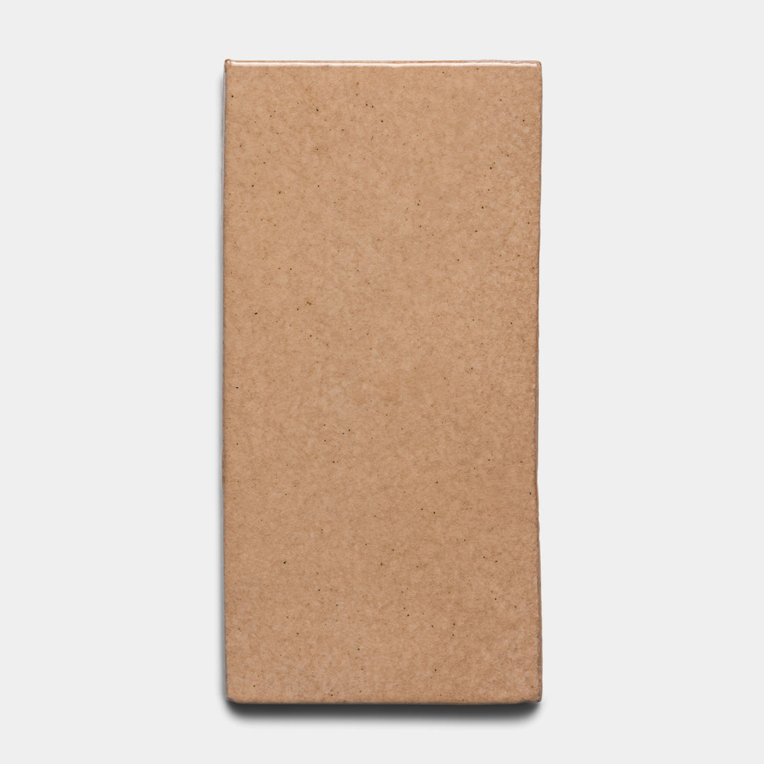 The Posada 4x8 Rectangle by Zia Tile is a rectangular, light brown bar with a smooth surface, displayed against a plain white background.