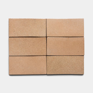 Six Zia Tile Posada 4x8 Rectangle bricks in light brown are arranged in two rows of three on a plain white background.