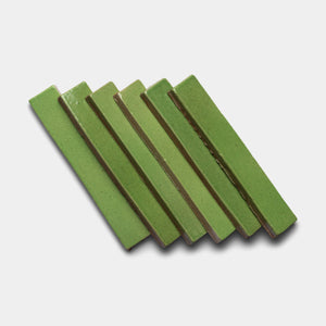 Six Zia Tile Primavera Mini Bars are arranged in a neat, slightly overlapping row on a white background.