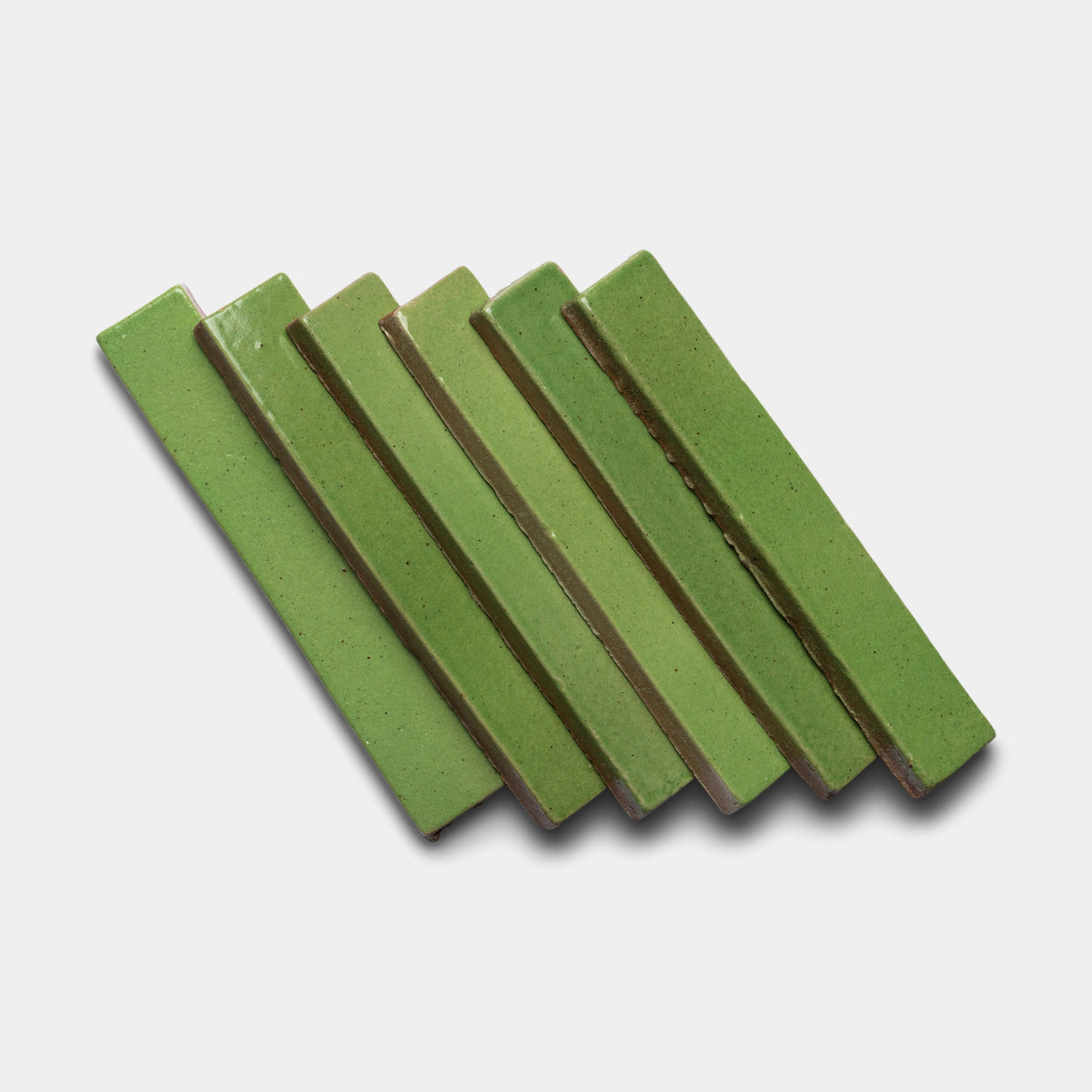 Six Zia Tile Primavera Mini Bars are arranged in a neat, slightly overlapping row on a white background.