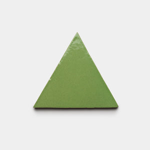The Primavera Triangle by Zia Tile, a glossy green equilateral tile, is centered on a plain white background.