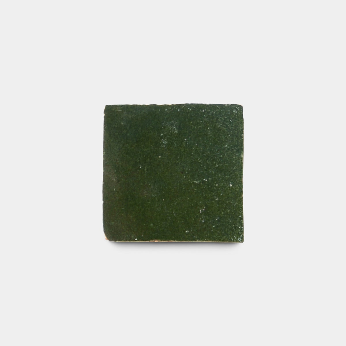 A single, square Prairie Green 2x2 sample tile by Zia Tile features a glossy dark green finish and is displayed on a plain white background.