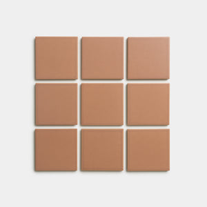 Nine Rhubarb 4x4 brown square tiles by Zia Tile arranged in a 3x3 grid on a white background.
