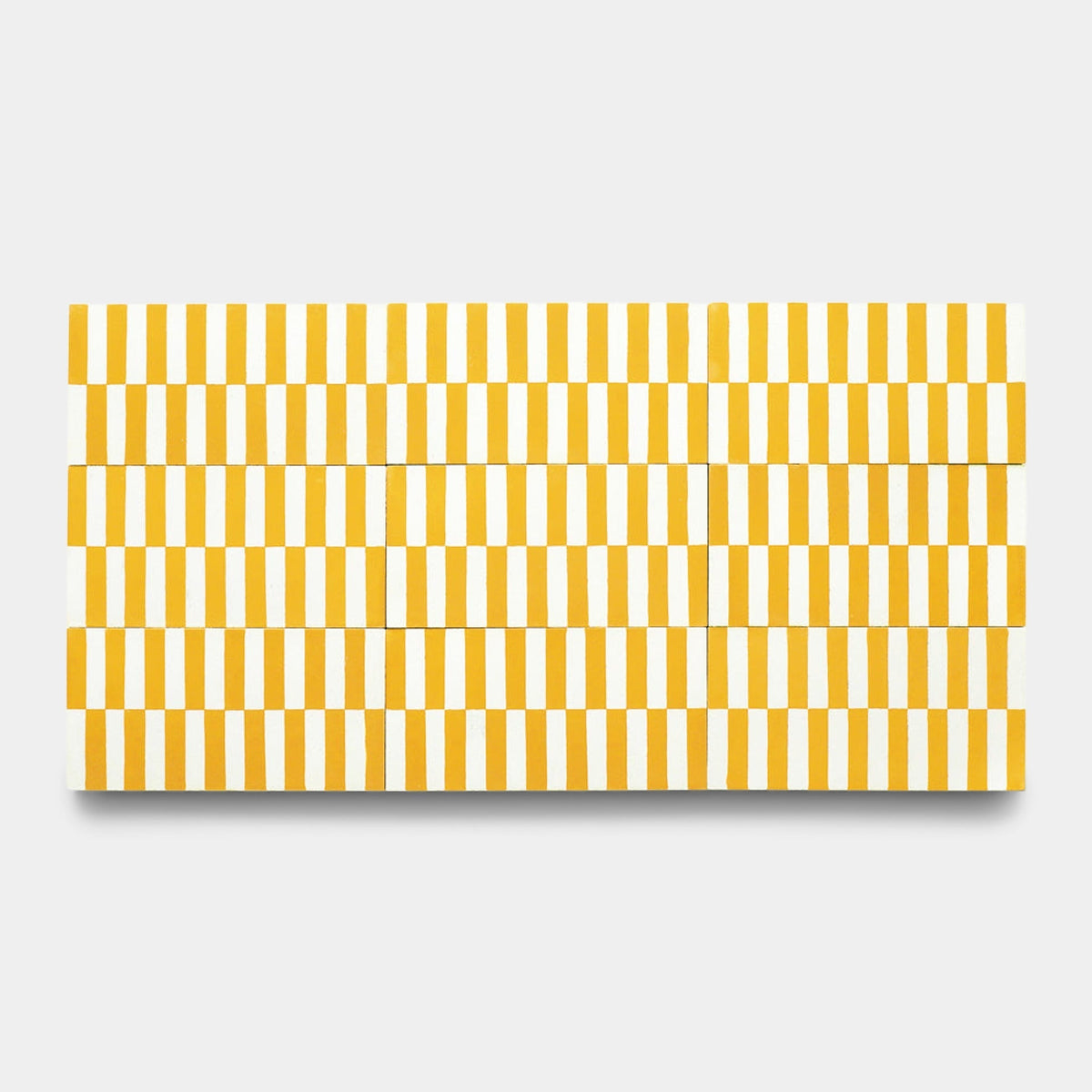 The Rialto Cadmium 4x8 Sample by Zia Tile features a rectangular design with vertical yellow and white stripes in a handmade tile-inspired pattern set against a light gray background.