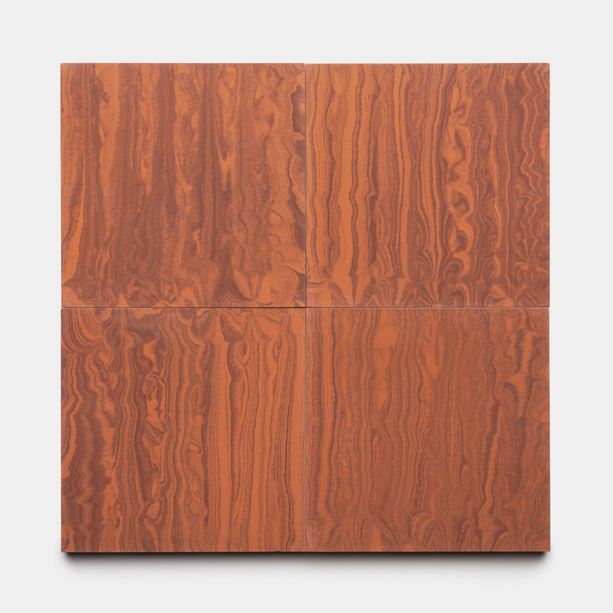 Four River Canyon + Rust 8x8 tiles by Zia Tile, arranged in a grid, display reddish-brown marbled wood-grain patterns on a plain white background.