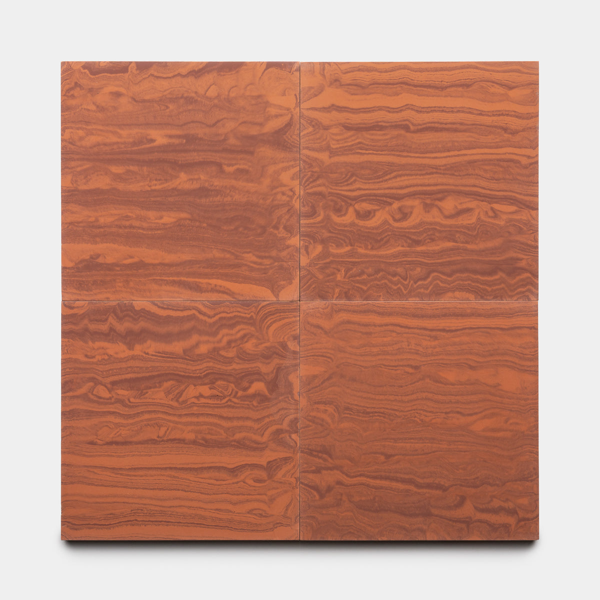 Four River Canyon + Rust 8x8 tiles by Zia Tile, featuring a reddish-brown wavy wood grain pattern, are arranged in a grid on a white background, creating a flowing, organic texture across the surface.
