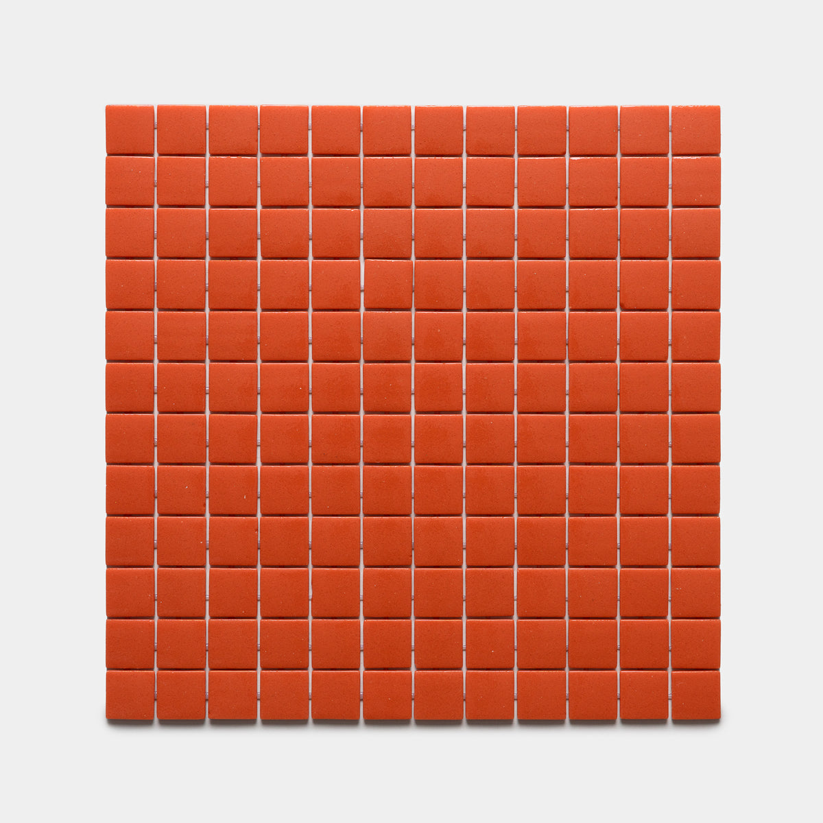 A grid of Roma 1x1 red tiles by Zia Tile, each small and square, arranged evenly on a plain white background.