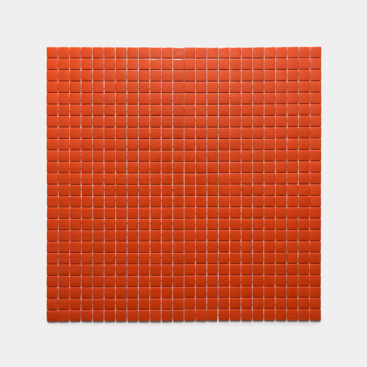 The Roma 1x1 by Zia Tile features a grid of small, evenly spaced red square tiles arranged in rows and columns on a white background.