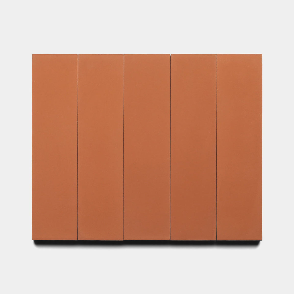 A minimalist artwork displays five vertical, evenly spaced rectangular panels in Zia Tile’s Rust 2x8 Sample color, arranged side by side against a plain white background.