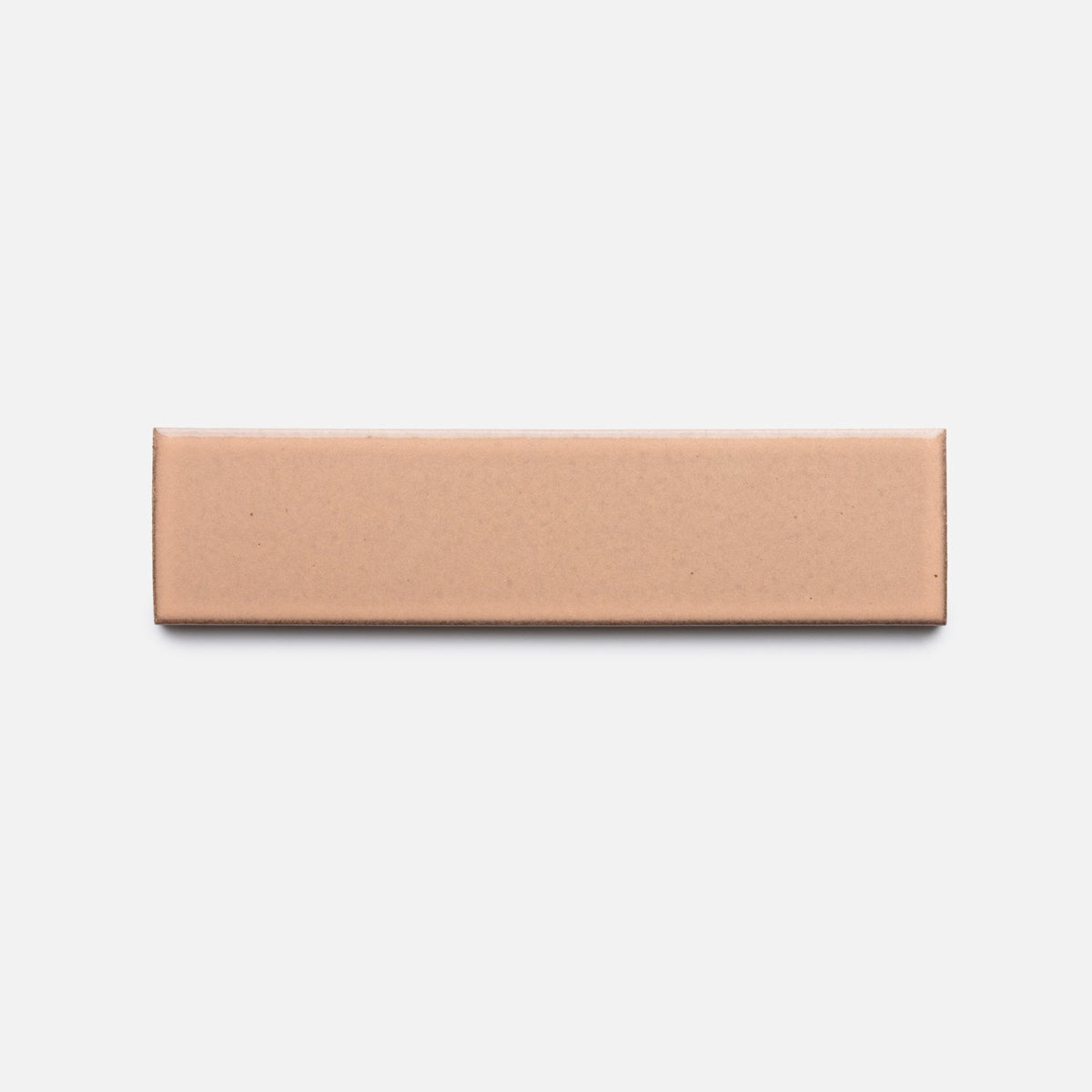 A rectangular, light brown Sakura + Flat, Sample box from Zia Tile is centered on a plain white background.
