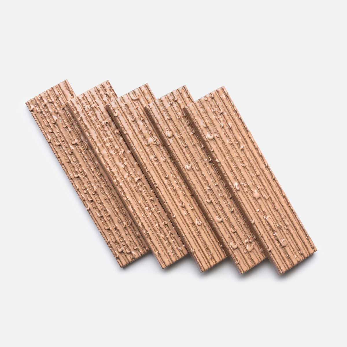 Five Sakura + Furrowed, Sample tiles by Zia Tile are arranged diagonally and overlapping on a plain white background.
