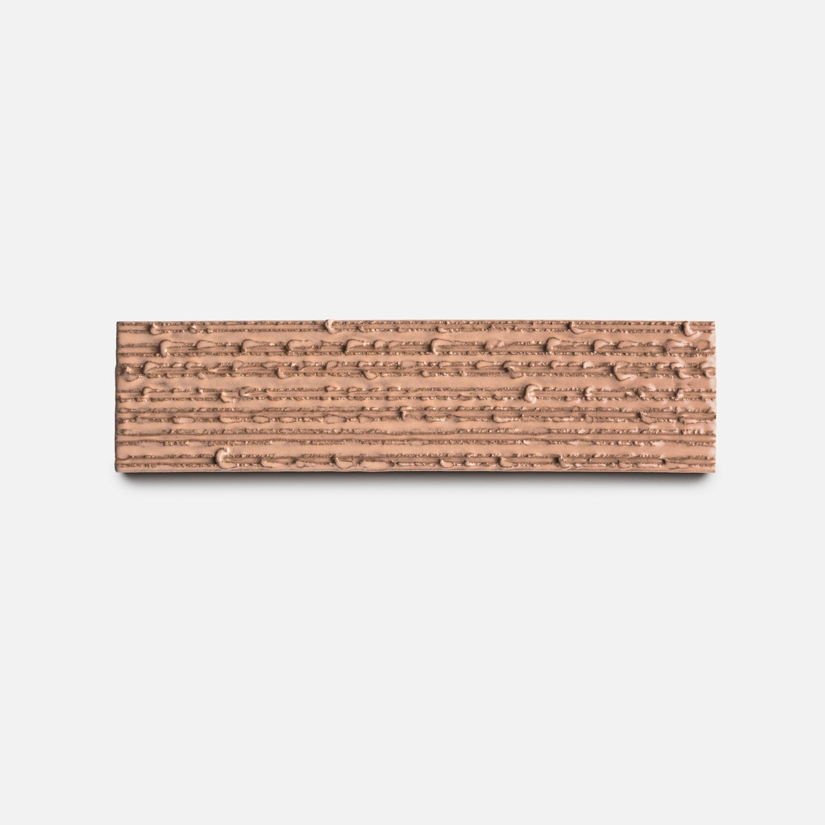 The Sakura + Furrowed sample from Zia Tile is a rectangular, light brown ceramic tile with a textured horizontal lined and dotted pattern on a white background.