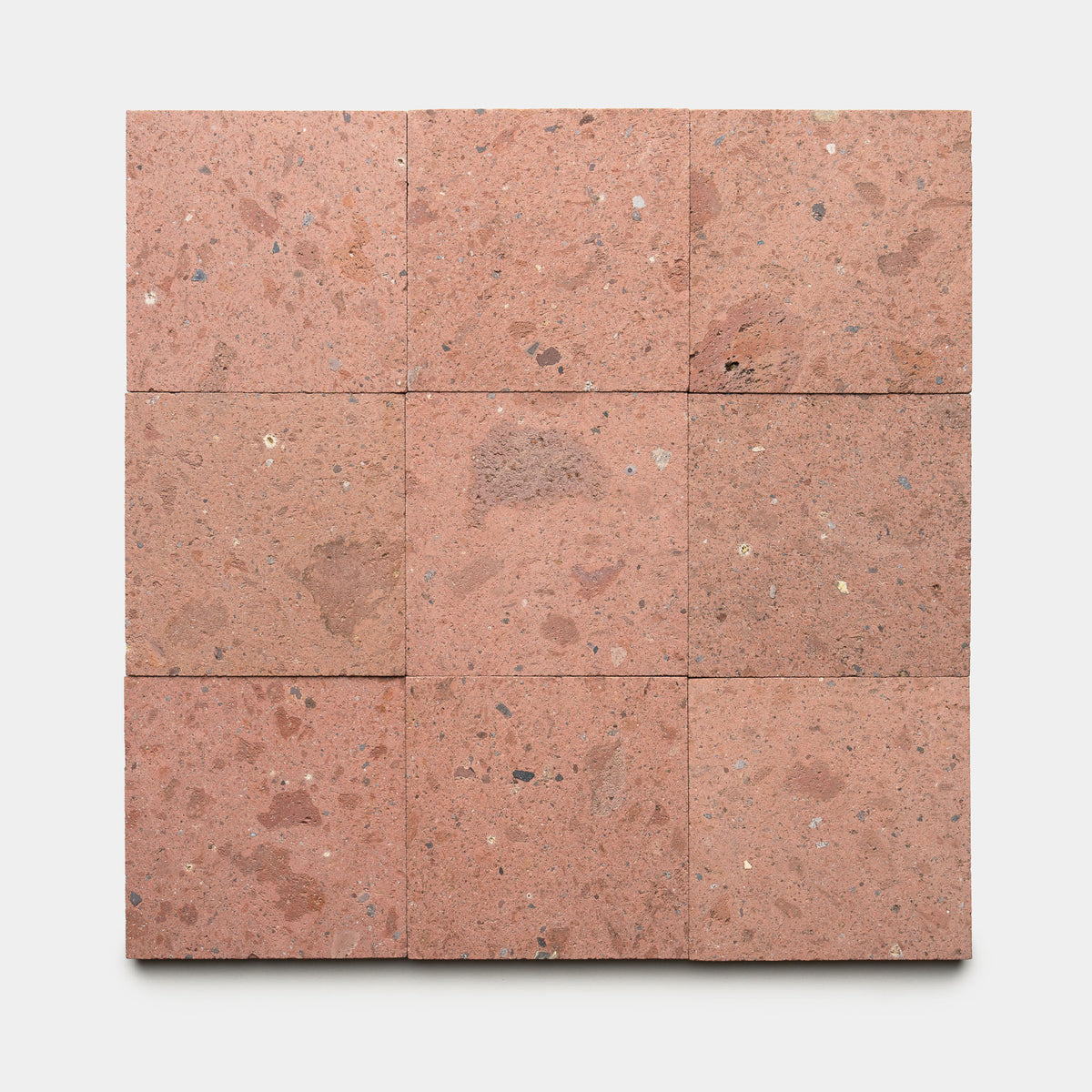 Nine Sedona 6x6 tiles by Zia Tile, reddish-brown with a rough, speckled surface and natural color variations, arranged in a 3x3 grid on a plain white background.