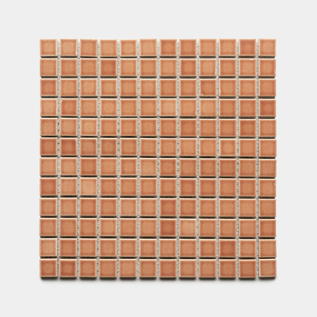 A square sheet of Zia Tile's Sepia 1x1 small, evenly spaced brown ceramic tiles is arranged in a grid pattern on a white background.