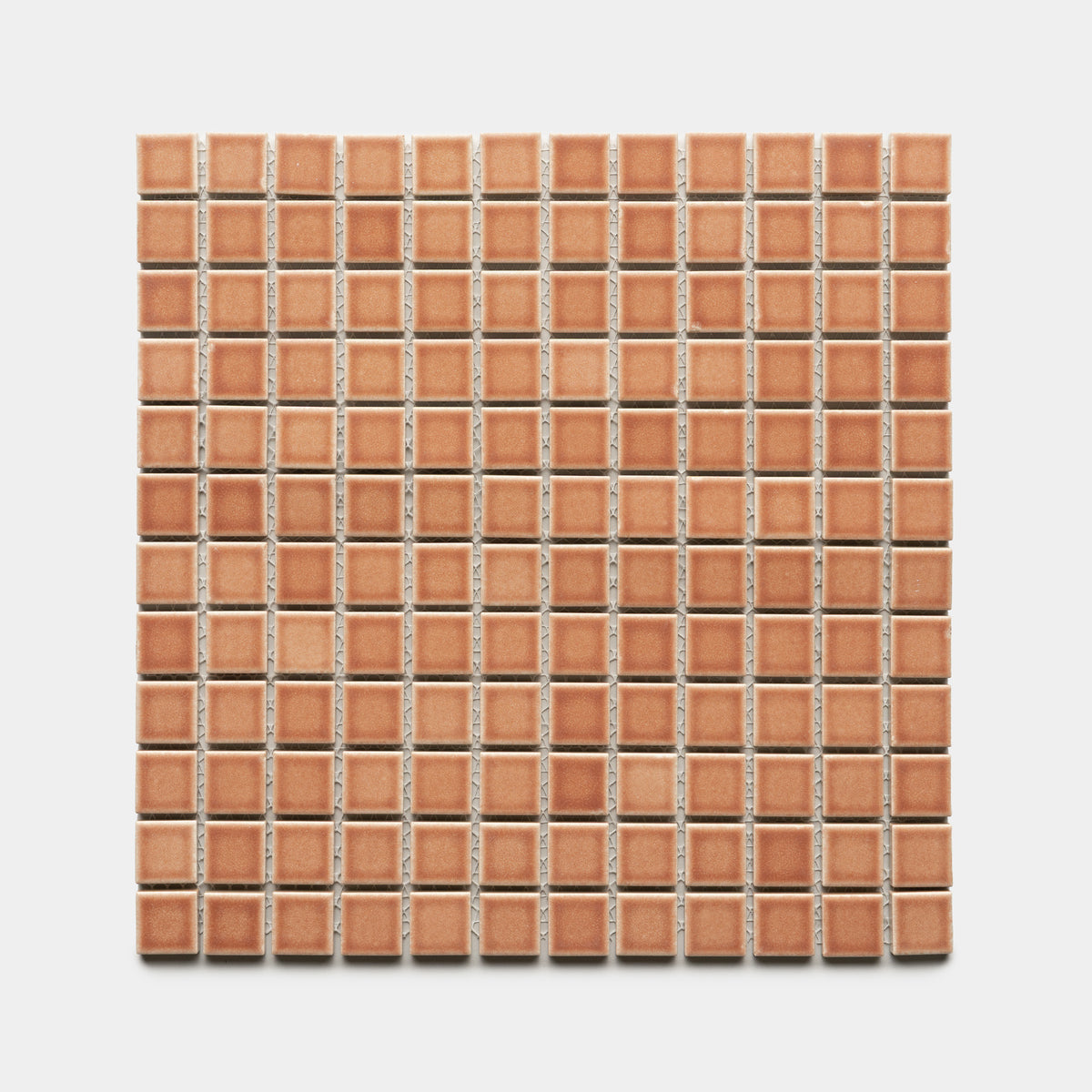 A square sheet of Zia Tile's Sepia 1x1 small, evenly spaced brown ceramic tiles is arranged in a grid pattern on a white background.