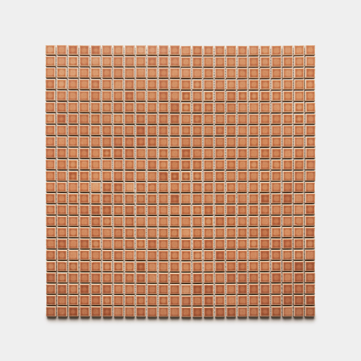 The Zia Tile Sepia 1x1 features square reddish-brown ceramic mosaic tiles arranged in a precise grid on a white background, creating a uniform and orderly look.