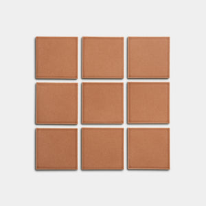 Nine Sepia 4x4 tiles by Zia Tile, featuring a brown tone and arranged in a three-by-three grid on a plain white background.