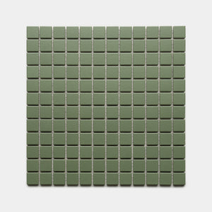 Sequoia 1x1 by Zia Tile features small, square, matte green tiles arranged in an even grid of rows and columns on a light gray background.