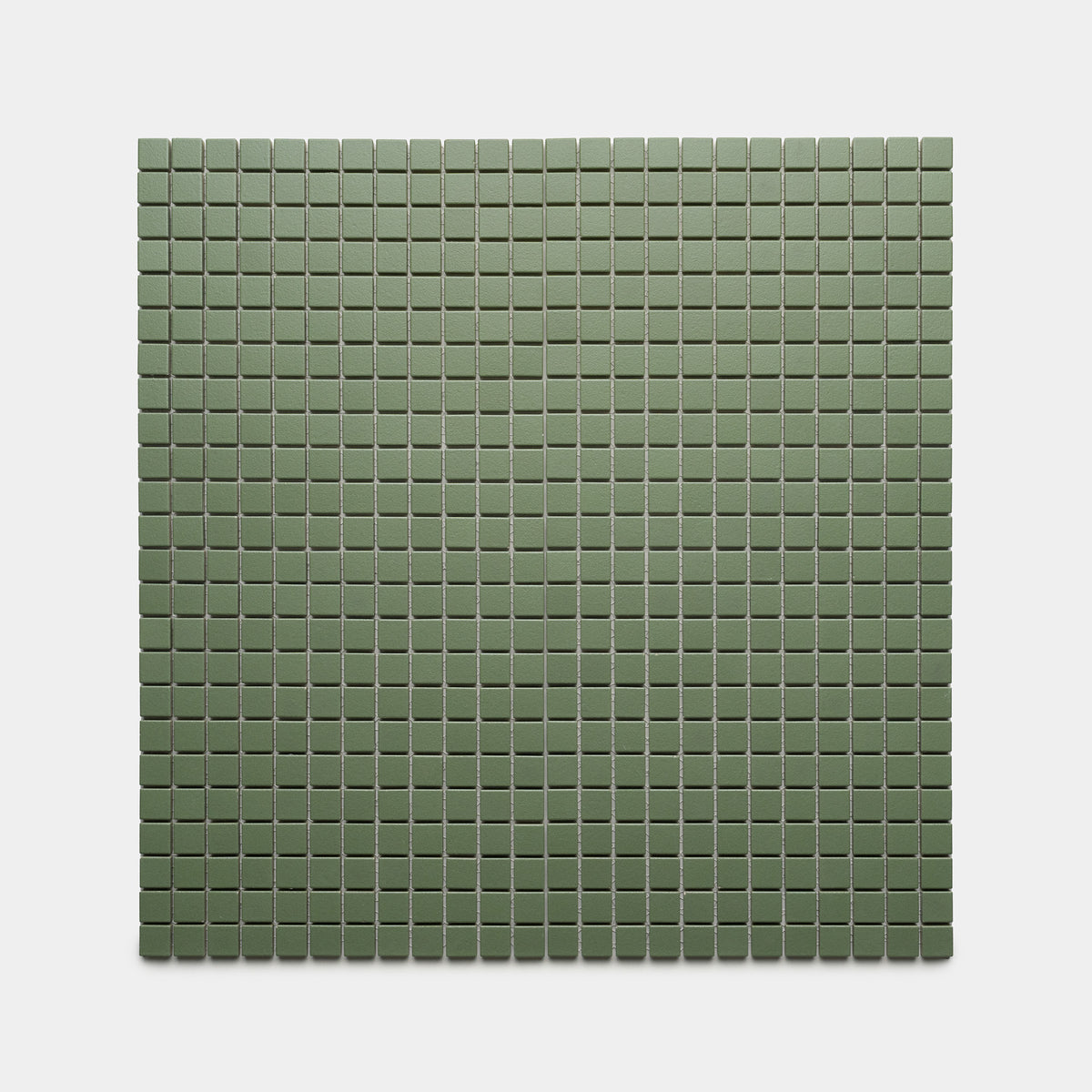 A square grid of Sequoia 1x1 matte green tiles by Zia Tile is arranged against a plain light gray background.