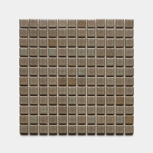 The Spanish Moss 1x1 by Zia Tile features small, square ceramic tiles in brown and olive green, arranged in an even grid on a white background.