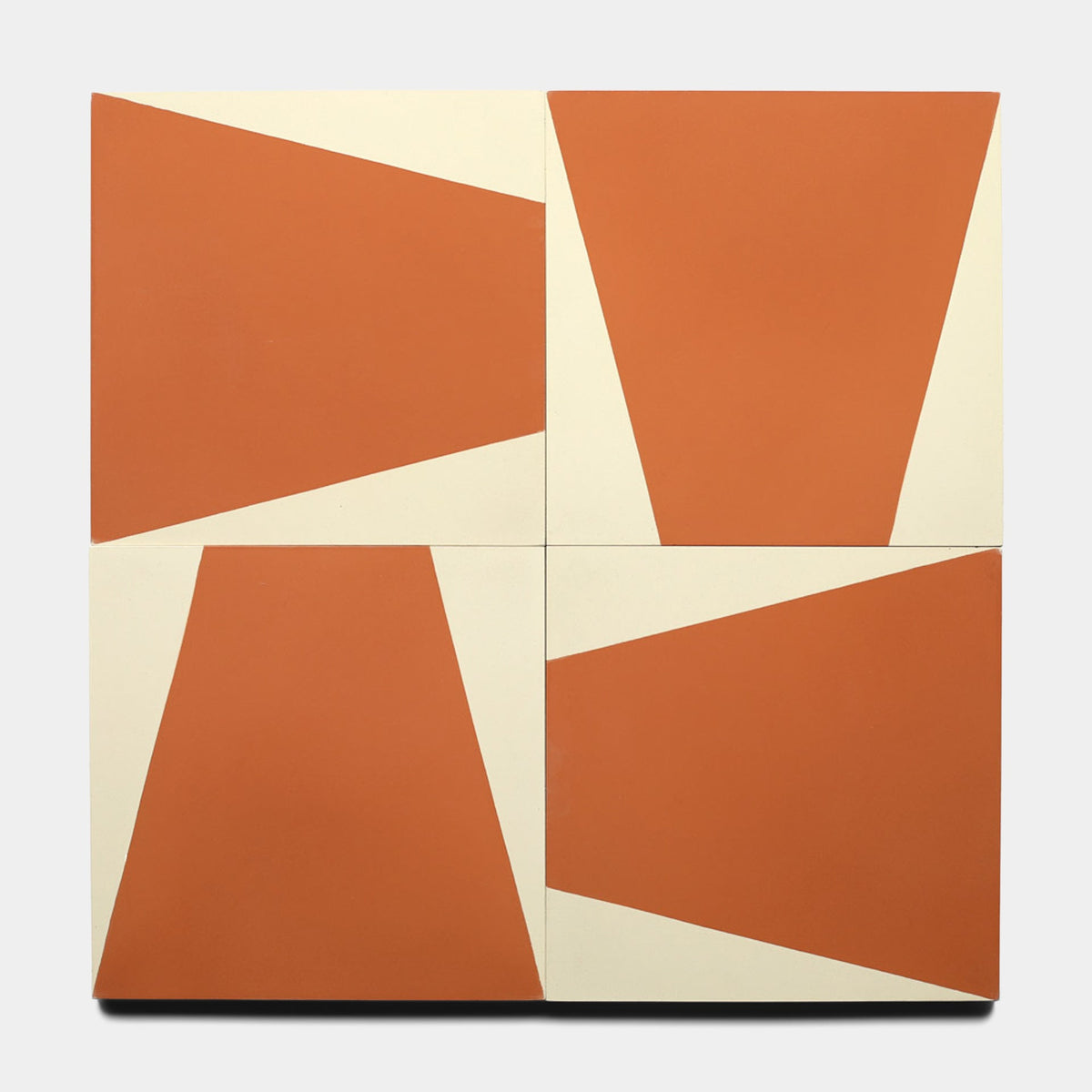 The Sparrow Rust 8x8 Sample by Zia Tile features four square tiles with abstract terracotta and cream geometric designs, forming an interlocking pattern of bold, angled lines on a white background.
