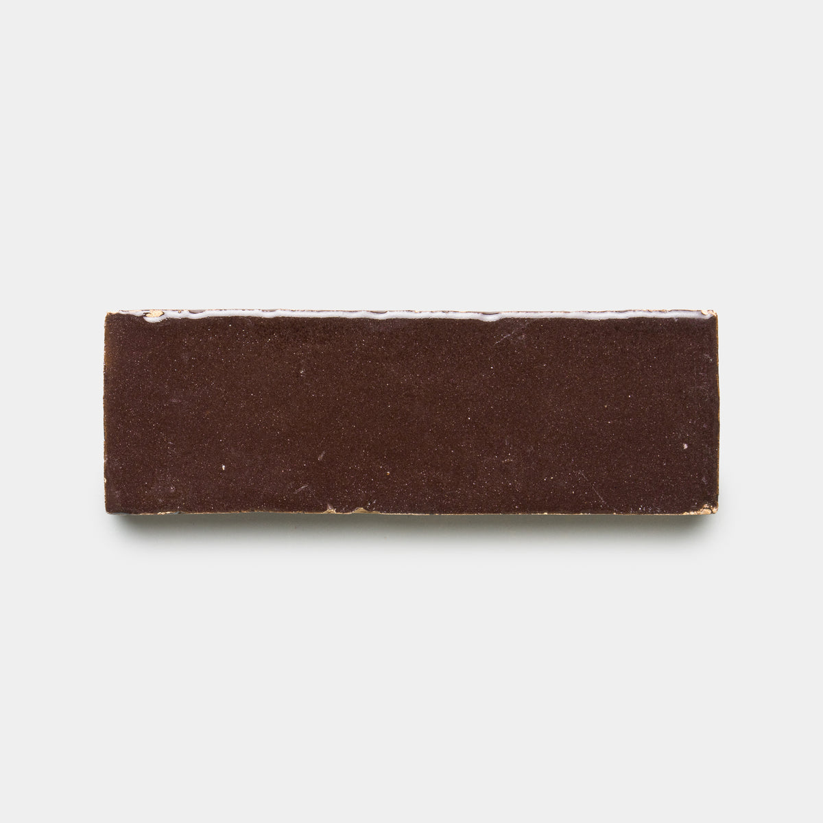 The Sumac 2x6 tile by Zia Tile, rectangular and unwrapped with a smooth, glossy surface, is shown against a plain white background.