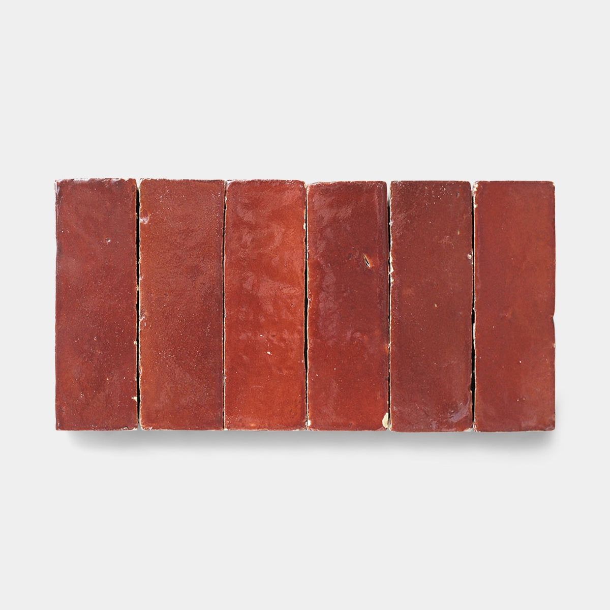 Five Terra Rosa 2x2 sample tiles by Zia Tile are arranged side by side in a horizontal row against a plain white background. Each tile has a handmade look, with a slightly glossy surface and rough edges.
