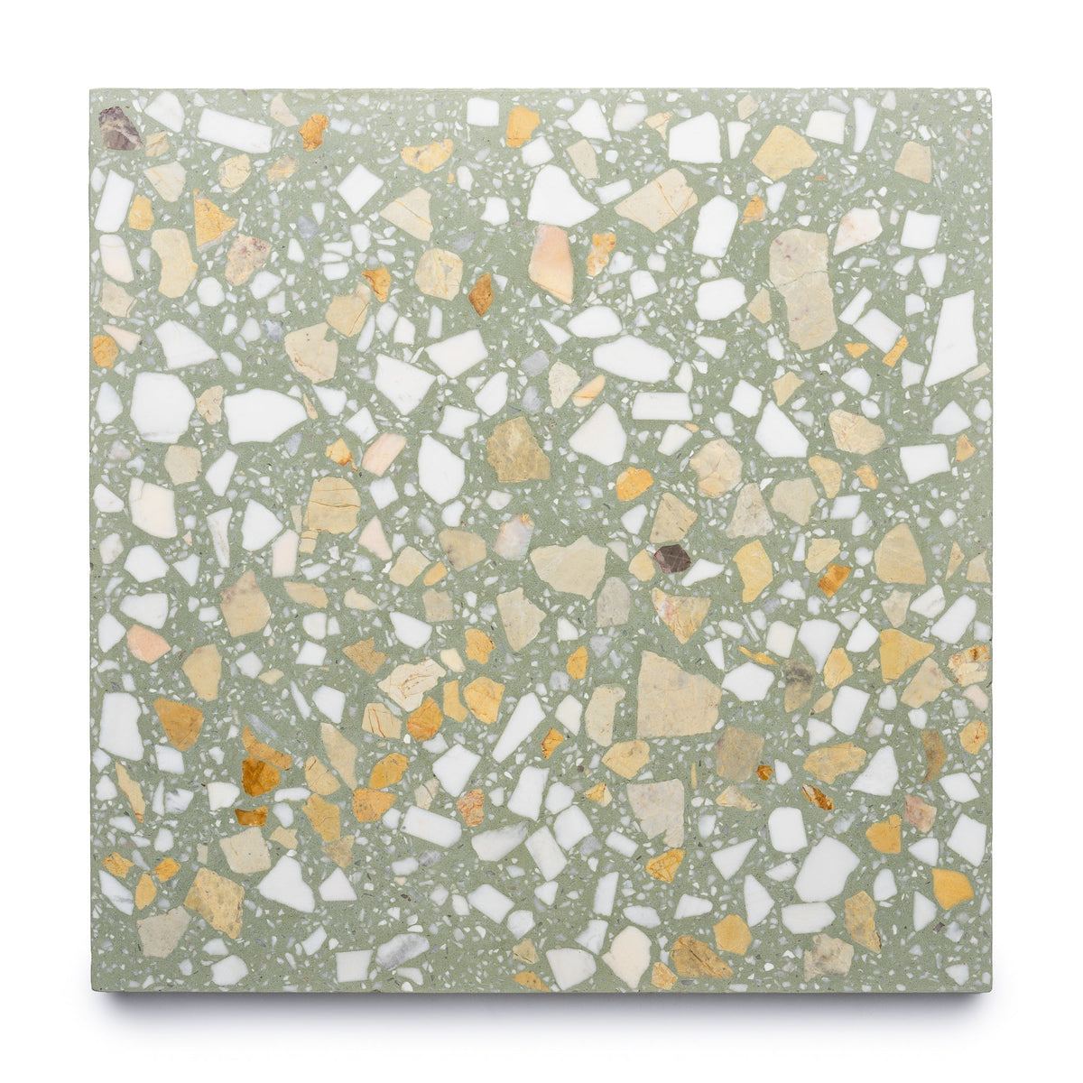 The Salt Bush 12x12 by Zia Tile is a terrazzo cement tile with a light green base and scattered white, beige, and yellow stone chips for a speckled, mosaic-inspired look.