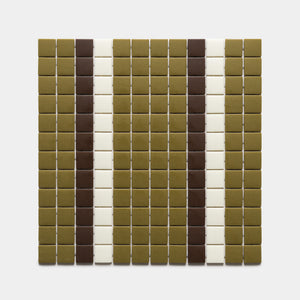 The Union Lichen + Marmot + Milk, Sample by Zia Tile features small square tiles arranged in vertical stripes of olive green, brown, and white on a light background for a striking striped pattern.