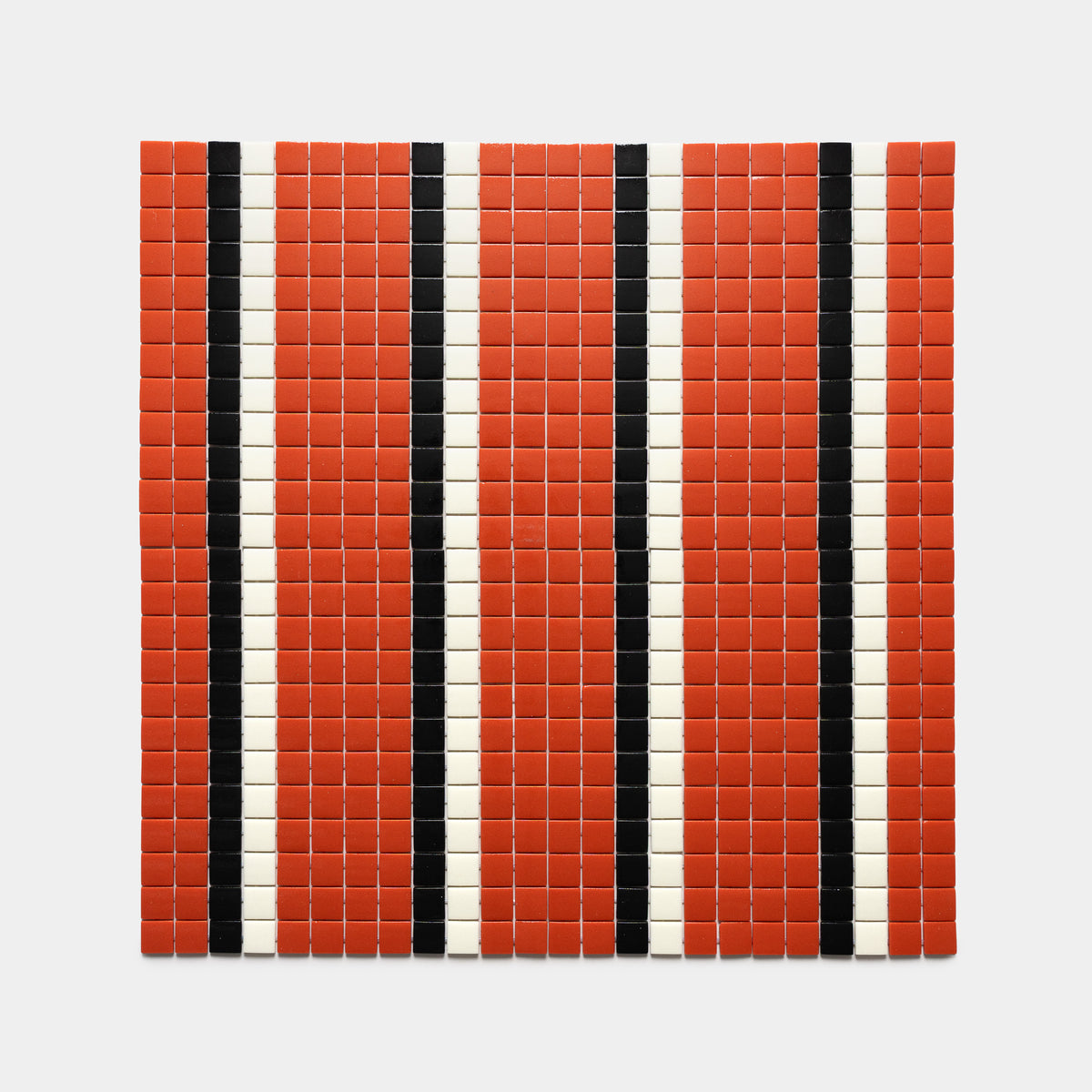 The Union Roma + Jet Black + Milk by Zia Tile features a square grid of small red tiles, each with three evenly spaced vertical stripes—black and white lines—set against a white background.