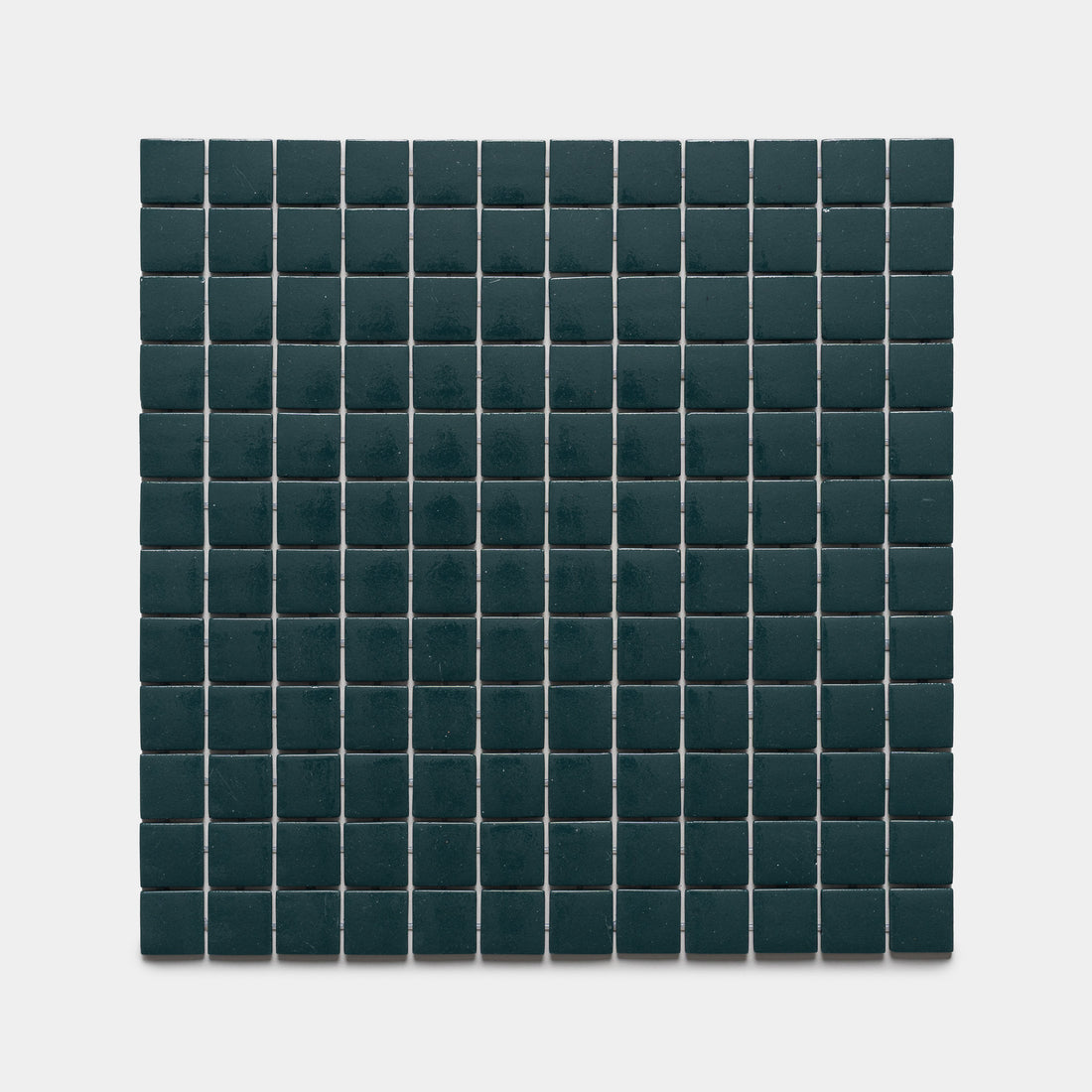 A grid of Vespertine 1x1 dark green square tiles by Zia Tile, arranged evenly on a white background.