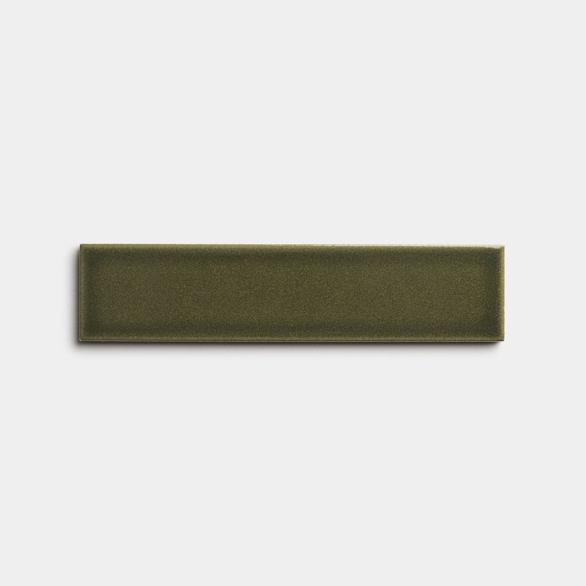A single rectangular Vetiver 2x8 nameplate by Zia Tile, in olive green with a flat surface and no text, displayed against a plain white background.