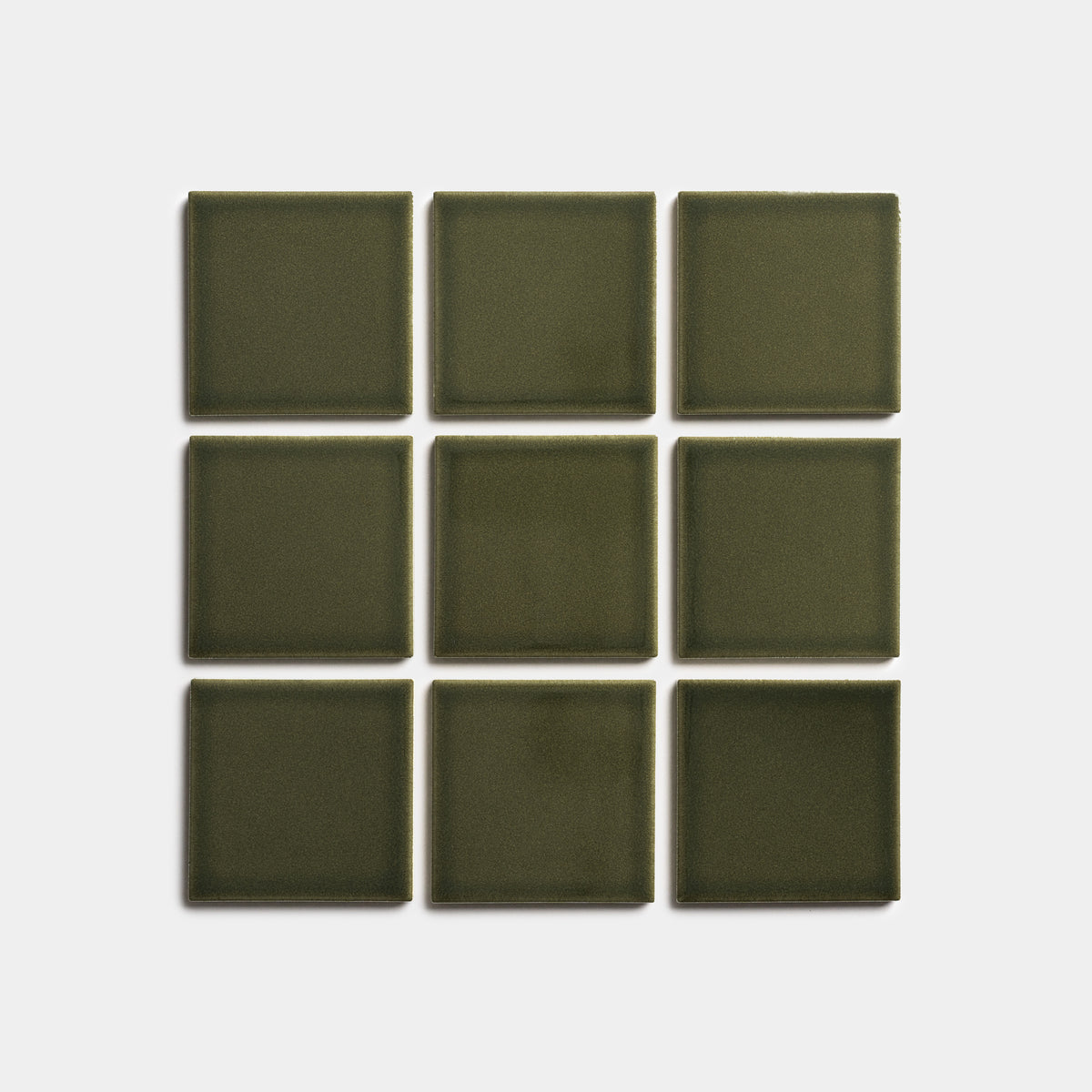 Nine Vetiver 4x4 olive green tiles by Zia Tile, arranged in a 3x3 grid on a plain white background.