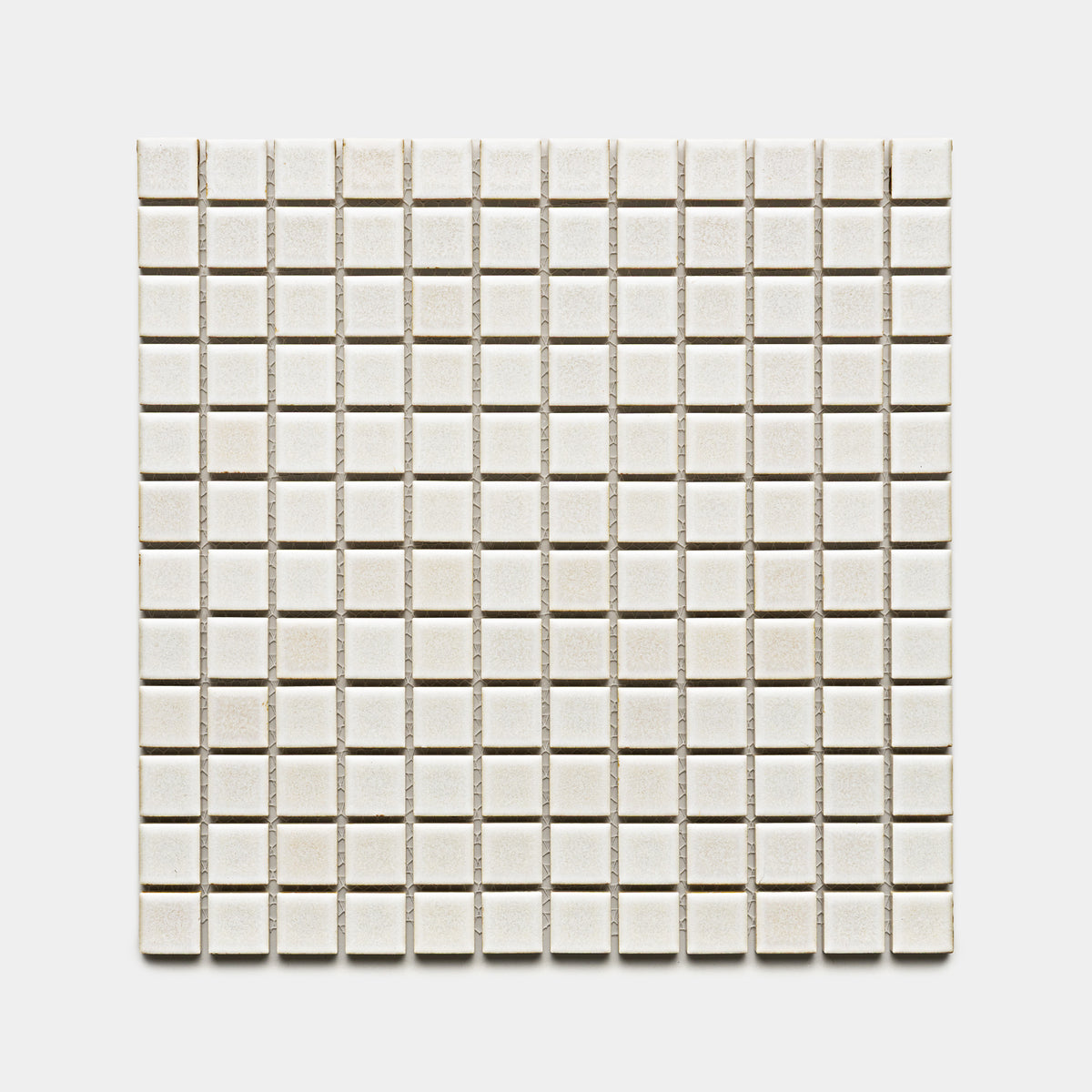A grid of Wool 1x1 small, square, off-white ceramic tiles by Zia Tile arranged symmetrically on a plain white background.