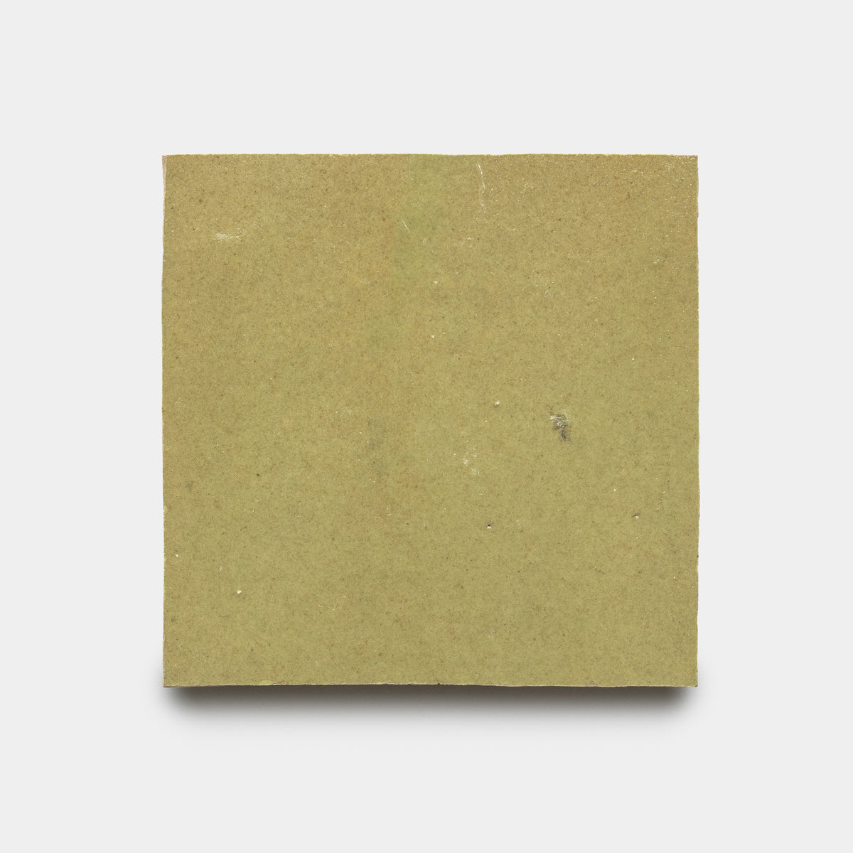 A single 4x4 Za'atar tile by Zia Tile, plain and light green, photographed against a white background.