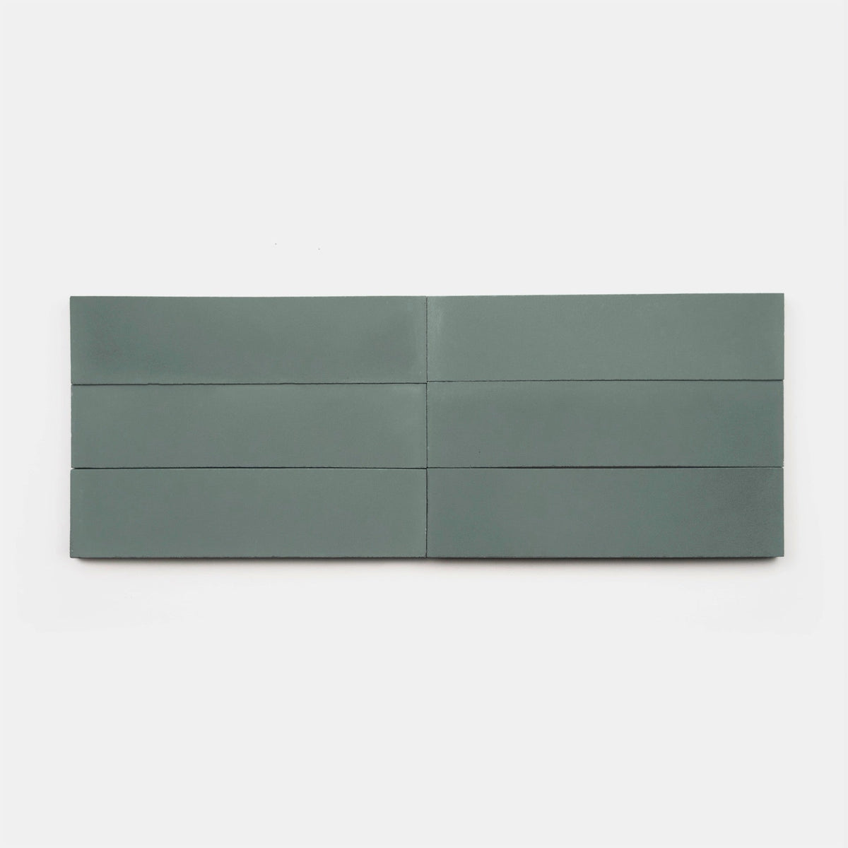 Six rectangular, matte gray Zeppelin 2x8 cement tiles from vendor-unknown are arranged in two rows of three on a white background.