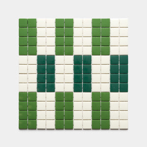 A grid of square tiles from Zia Tile's d'Orsay Clover + Milk + Jasper Sample features dark green, light green, and white tiles on a light gray background, creating alternating columns of green and white shapes.
