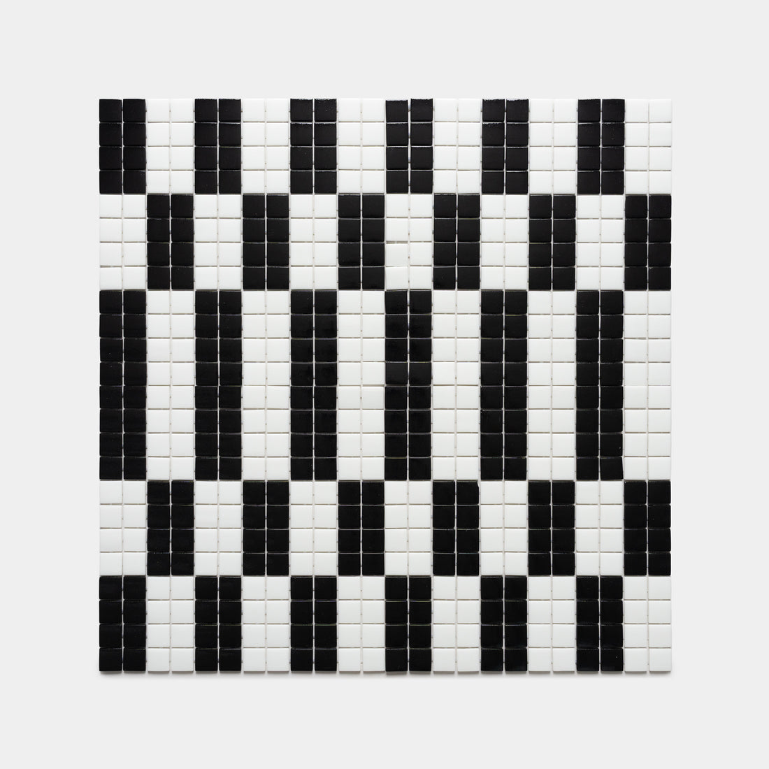 The d'Orsay Jet Black + Paperwhite by Zia Tile features a square grid of small tiles forming geometric vertical black rectangles in horizontal rows on a white background.