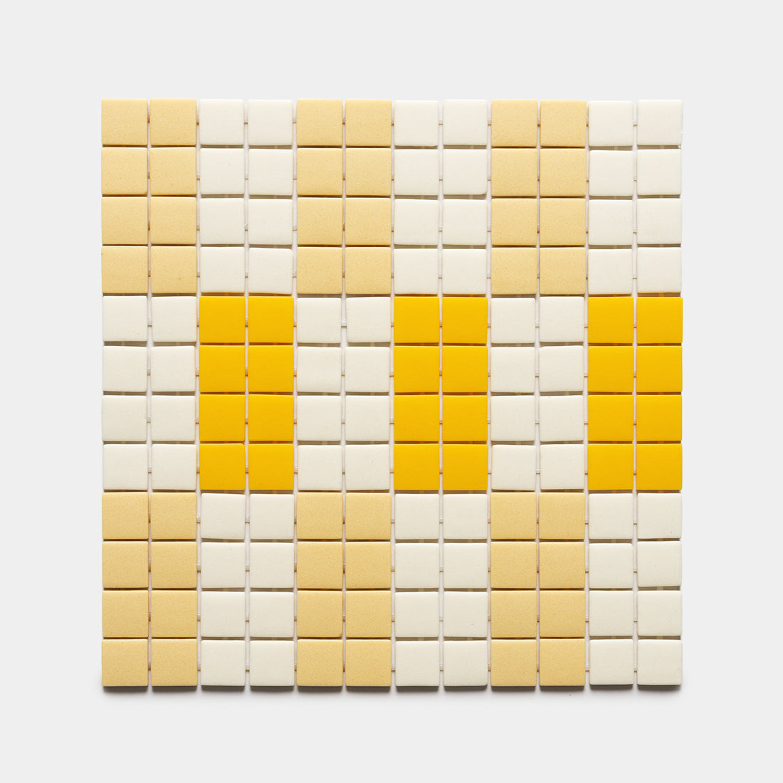 The Zia Tile d'Orsay Buttercup + Sesame + Canary Sample features a geometric grid of beige and yellow rectangular tiles, with vertical yellow stripes set among beige rows on a crisp white background.