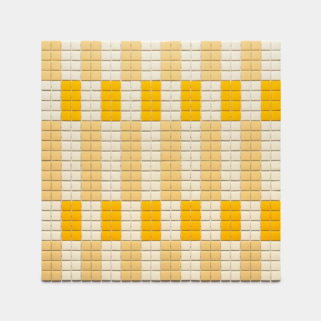 The d'Orsay Buttercup + Sesame + Canary by Zia Tile is a square mosaic panel with small yellow, beige, and cream tiles in a geometric grid pattern on a plain light gray background.