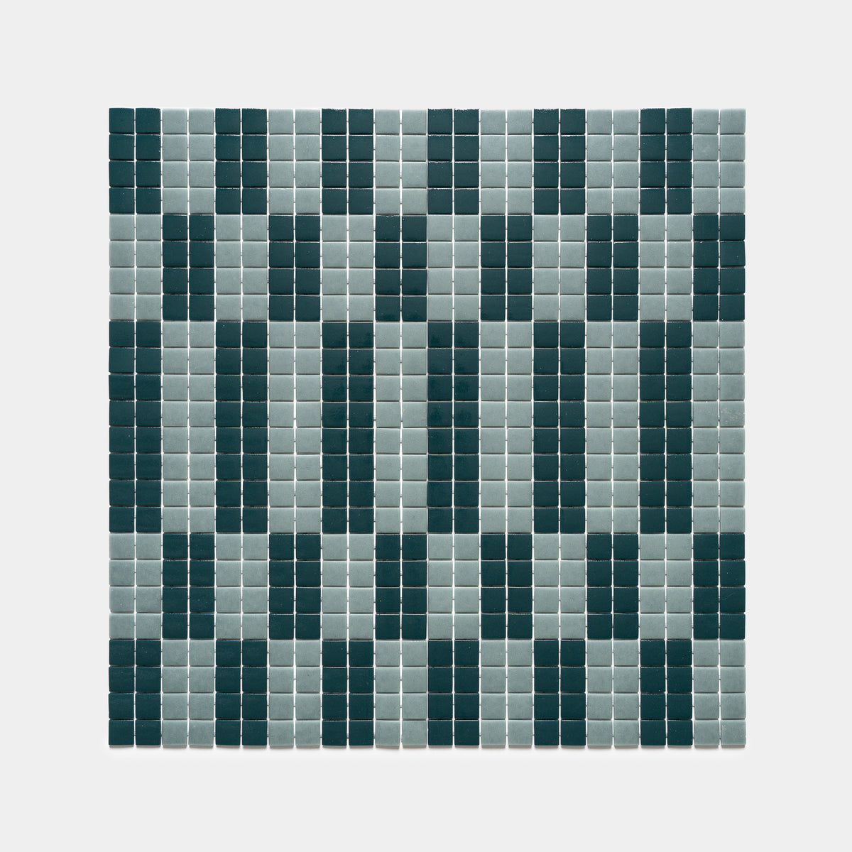 The d'Orsay Vespertine + Marine Layer by Zia Tile features a square grid of small tiles in alternating light gray and dark green, forming a geometric, mosaic pattern on a light background.